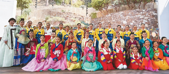 Performers gather after the Hangawi Autumn Festival of Korea at the Ford Theatre