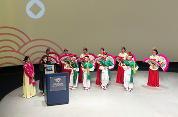 Eung Hwa Kim and academy members receive recognition at the Aquarium of the Pacific